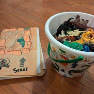 Bucket Full Of Dinosaurs And Dinosaur Board Game